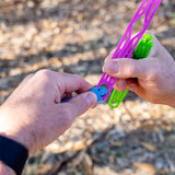 Clipping the pegless clothesline slides together to set the length