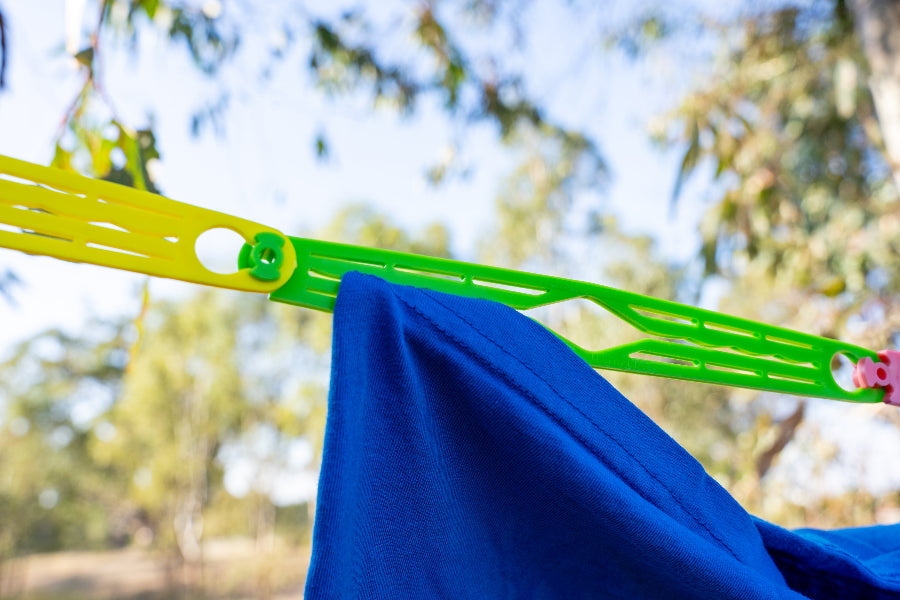 Close up of how the pegless clothesline slides grip clothing without pegs